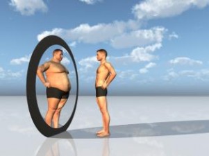 What can you tell about a person with obesity by looking at them? Obesity and status cues.